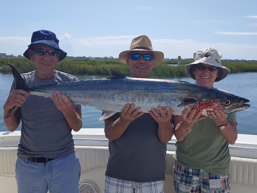 A group of 3 people fishing in SC