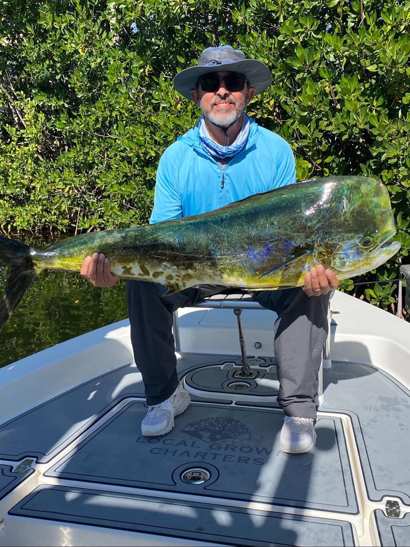 Large mahi mahi fish displayed on fishing boat in Key Largo FL
