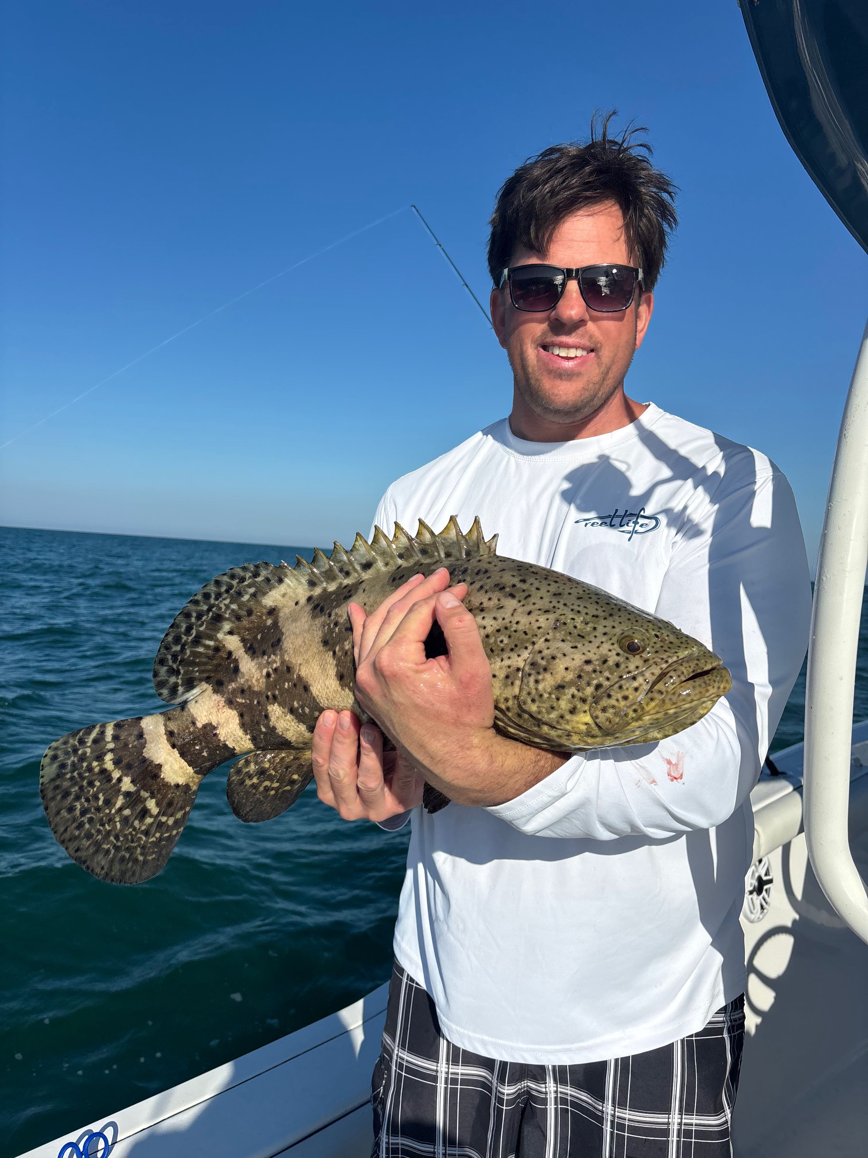 A person fishing on Marco Island