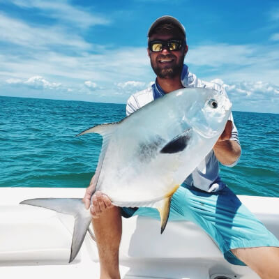 Marco Island offshore fishing charter boat with anglers catching grouper and snapper