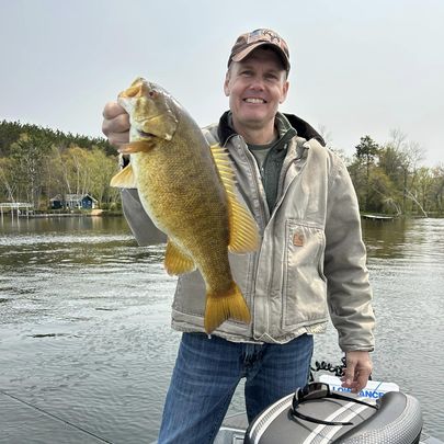 A person fishing in Hayward