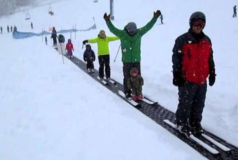 Person enjoying snow sports in NY