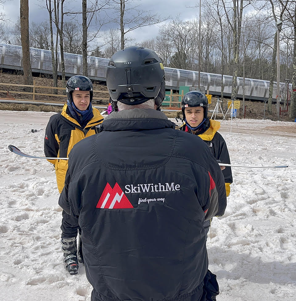 Two people enjoying snow sports in Orchard Park