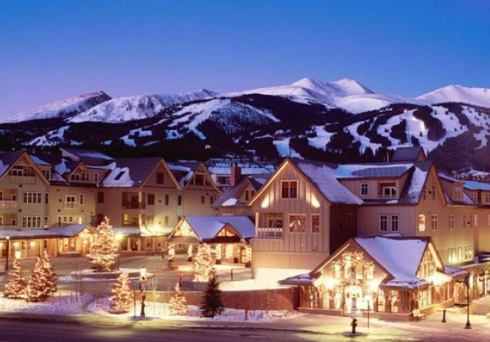 Utah ski resort with snowy mountain slopes and skiers for destination trip planning guide