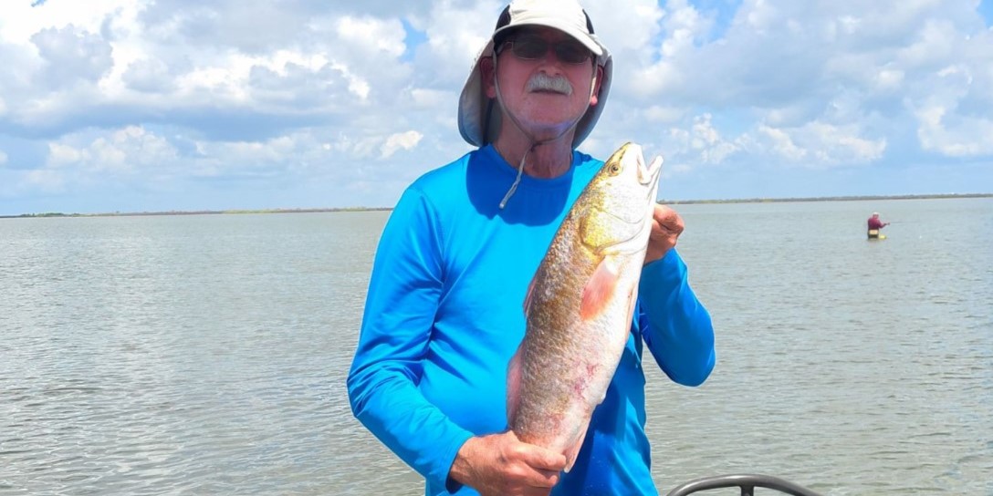 Solitary angler fishing in Port O'Connor