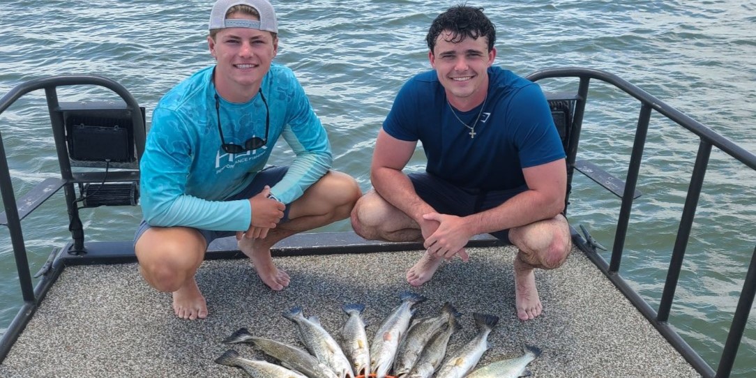 Two people fishing in TX