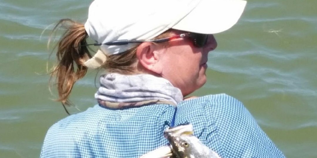 Man fishing on the dock in Port O'Connor