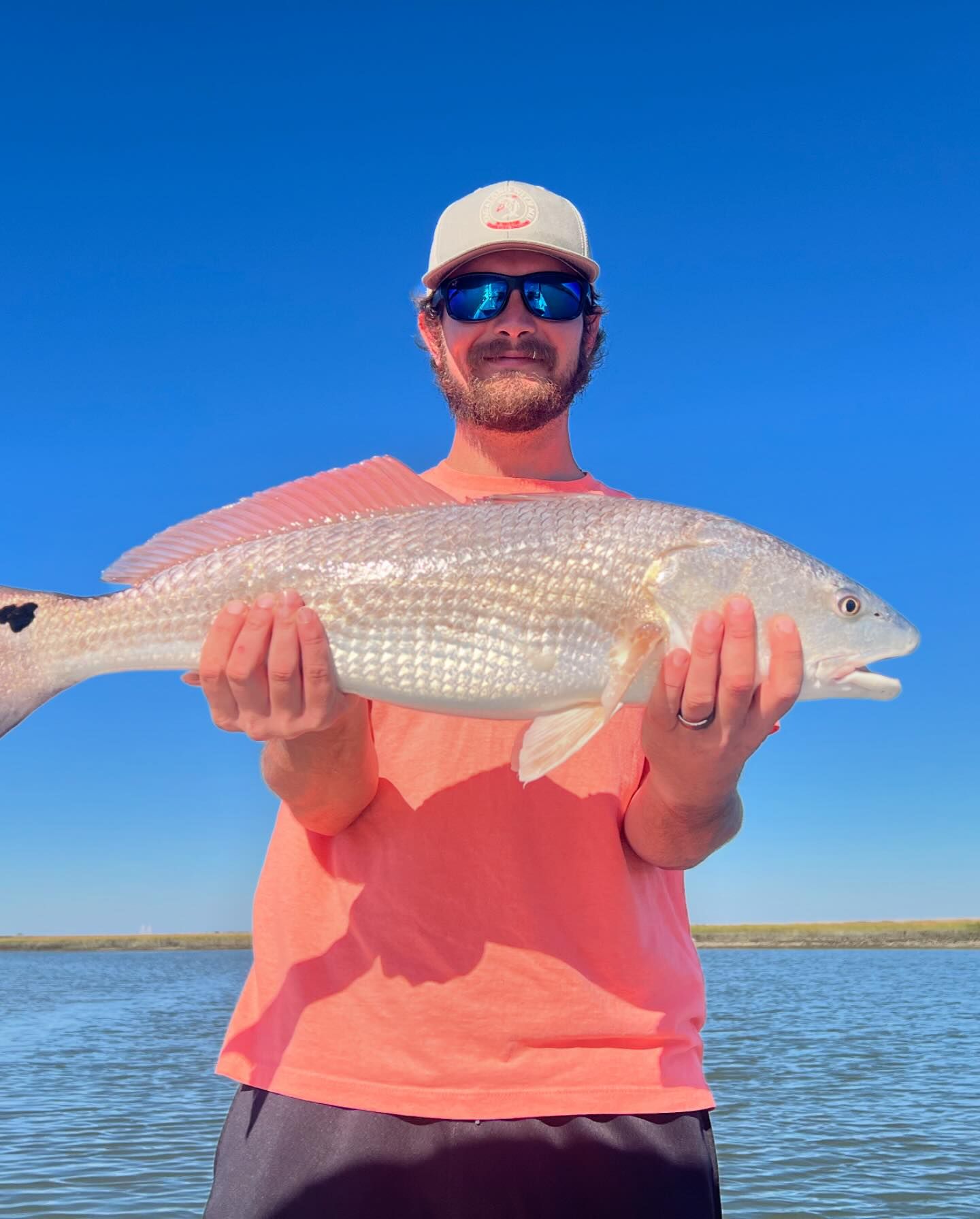A person enjoying a great day of fishing at Mount Pleasant