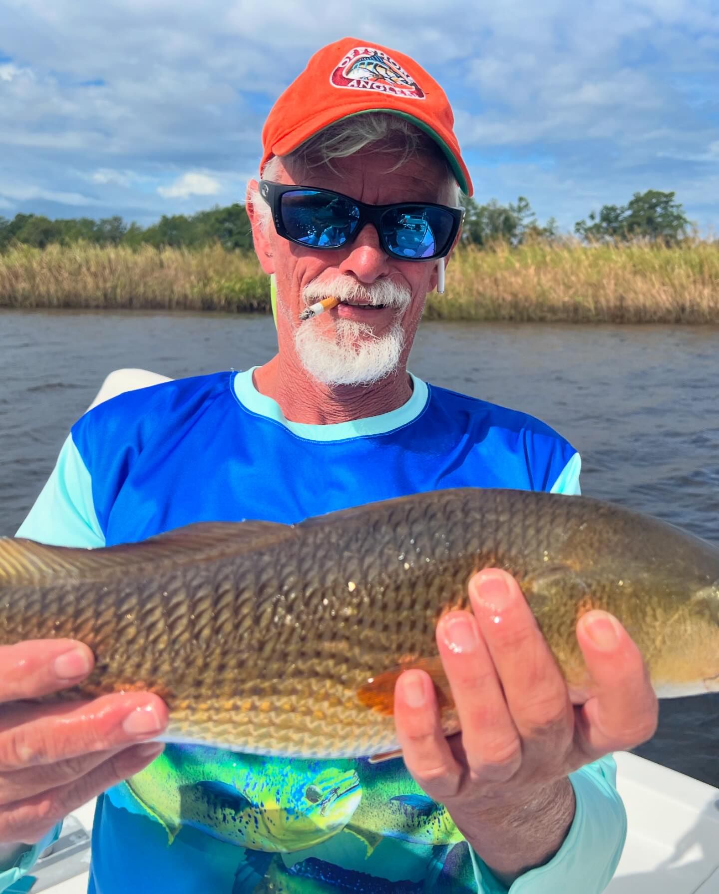 Angler with a 18-inch fish in Mount Pleasant