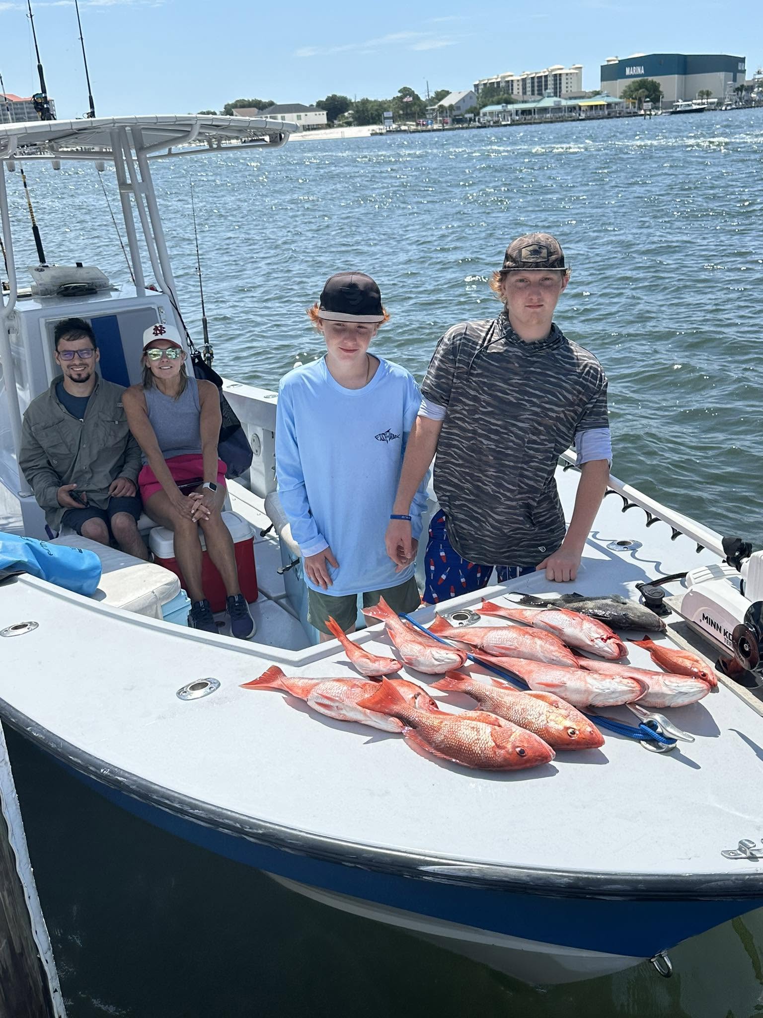 Fishing boat with fresh red snapper catch displayed on deck in Pensacola FL waters
