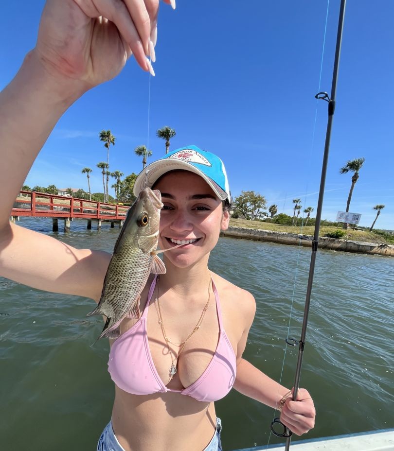 St Petersburg inshore fishing charter boat with anglers catching snook and redfish in Florida waters