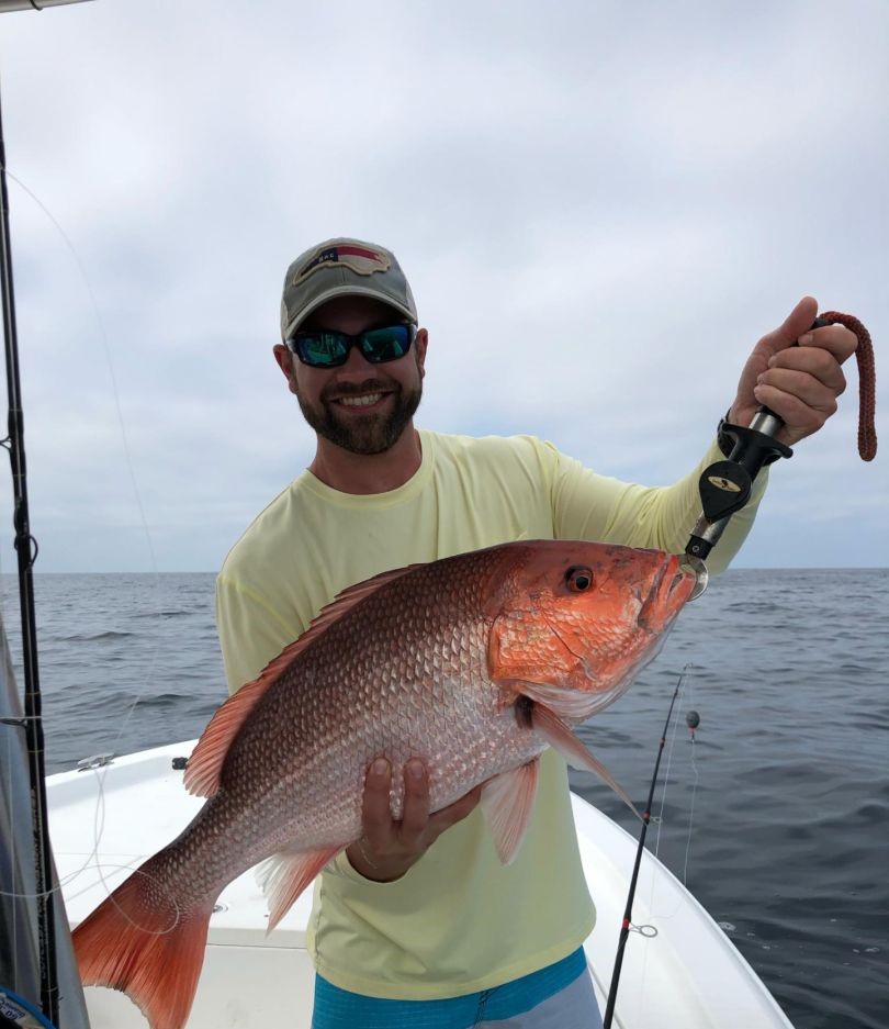 Anglers with a big 21-inch fish in FL