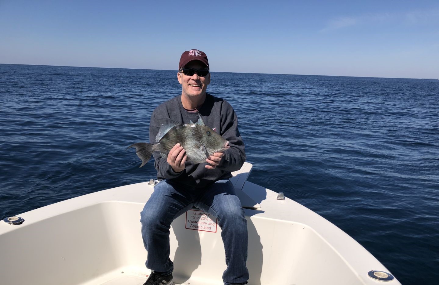 A Grey Triggerfish measuring 17 inches caught fishing in Destin