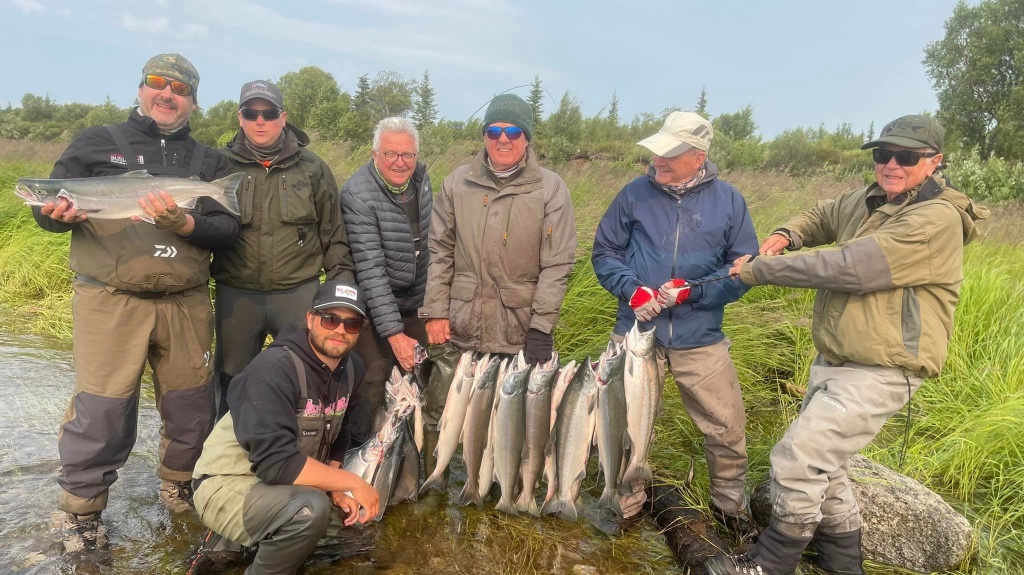 7 people enjoying a great fishing trip in MI