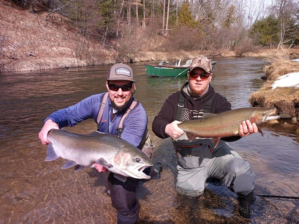 2 fishermen in MI catching 2 fish