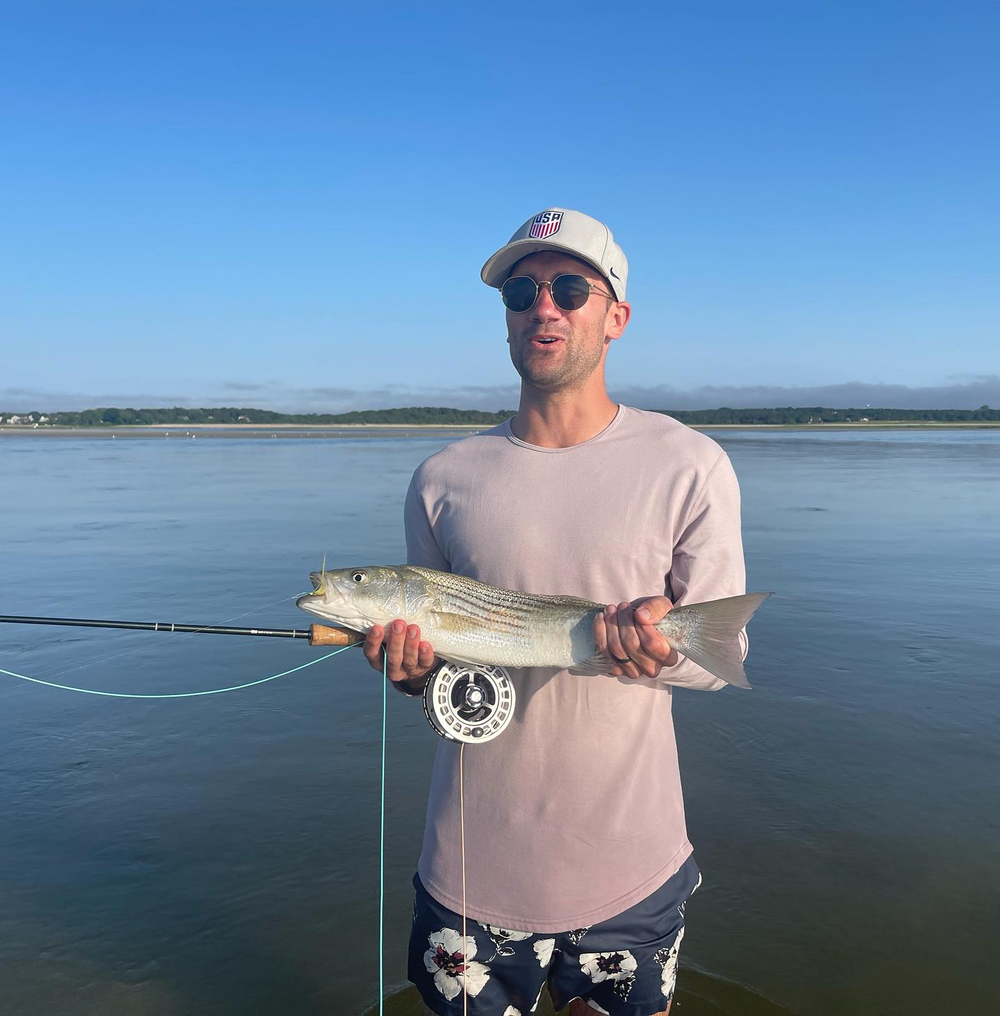 One fisherman catching a 13-inch fish in Brewster
