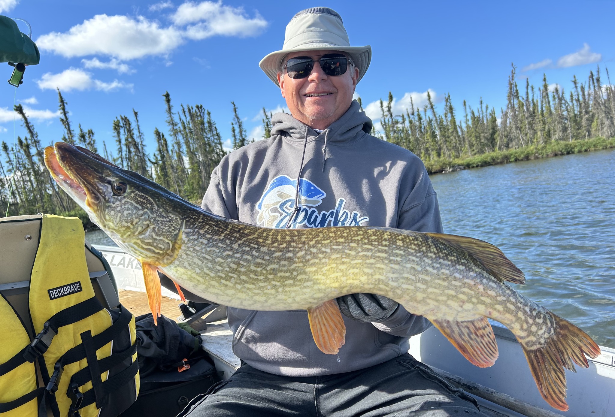 Northern Pike, a large freshwater fish, caught during a fishing tour in the South Slave Region.