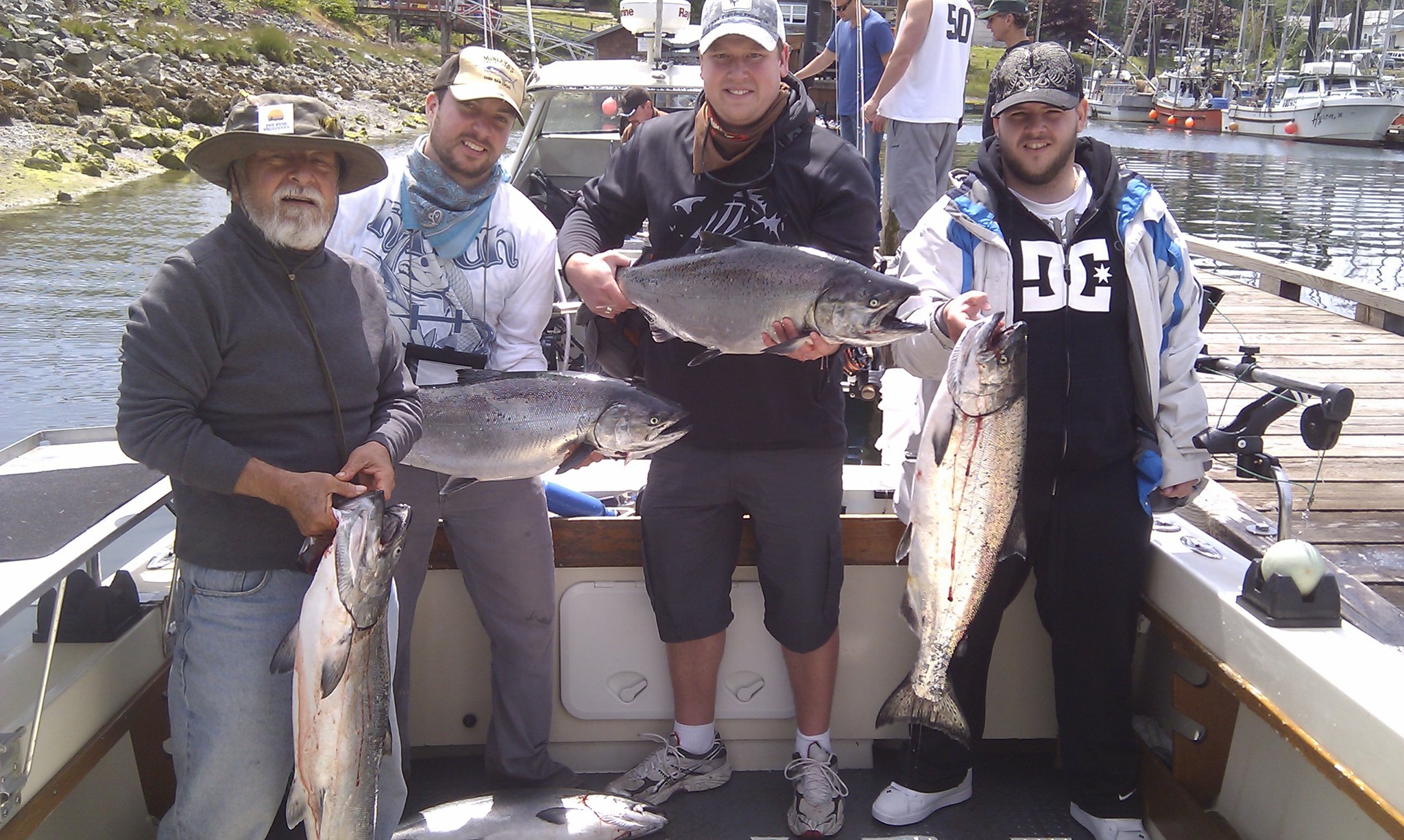 4 coho salmon caught by 5 people fishing in Ucluelet