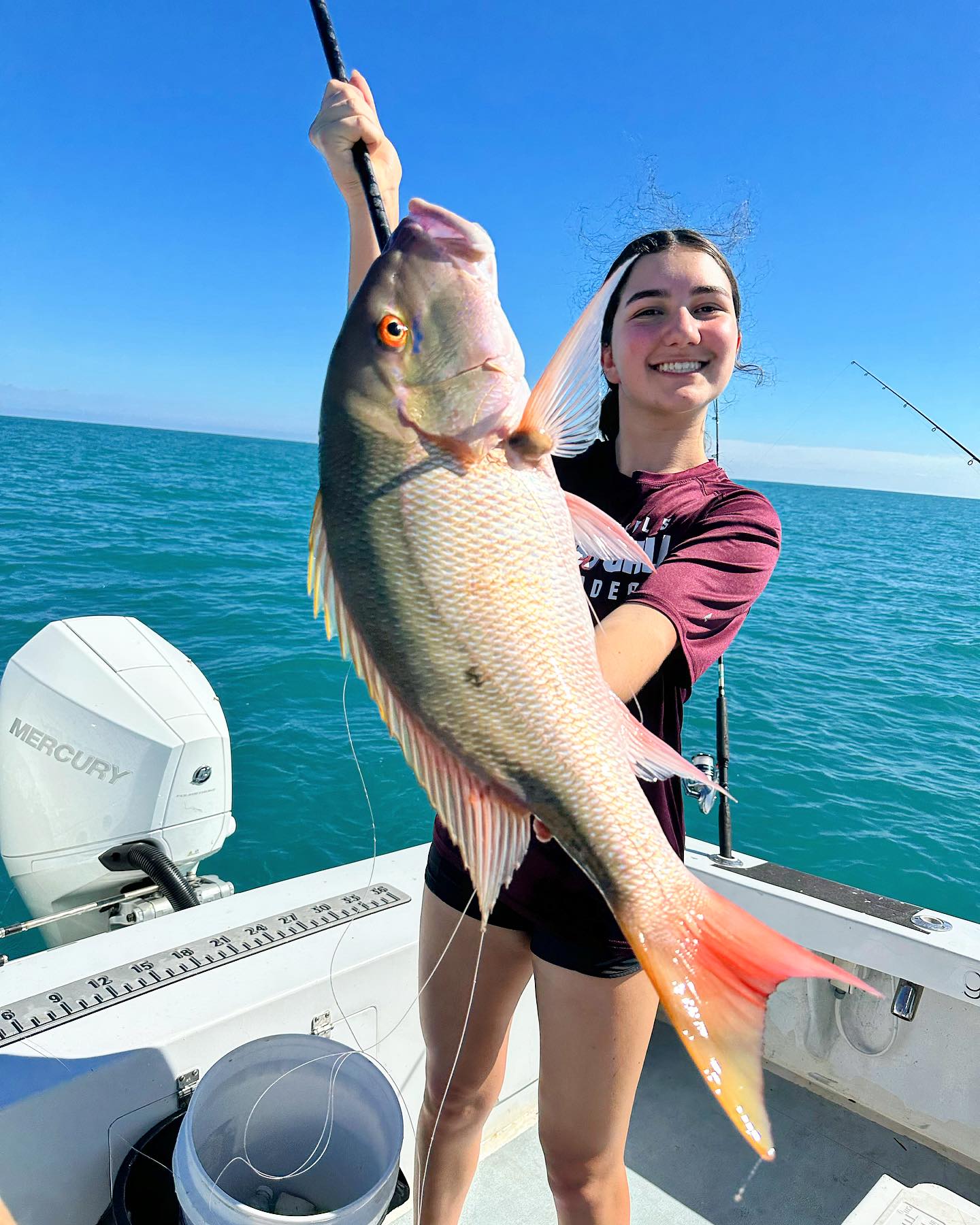 Angler holding a 31-inch fish in FL