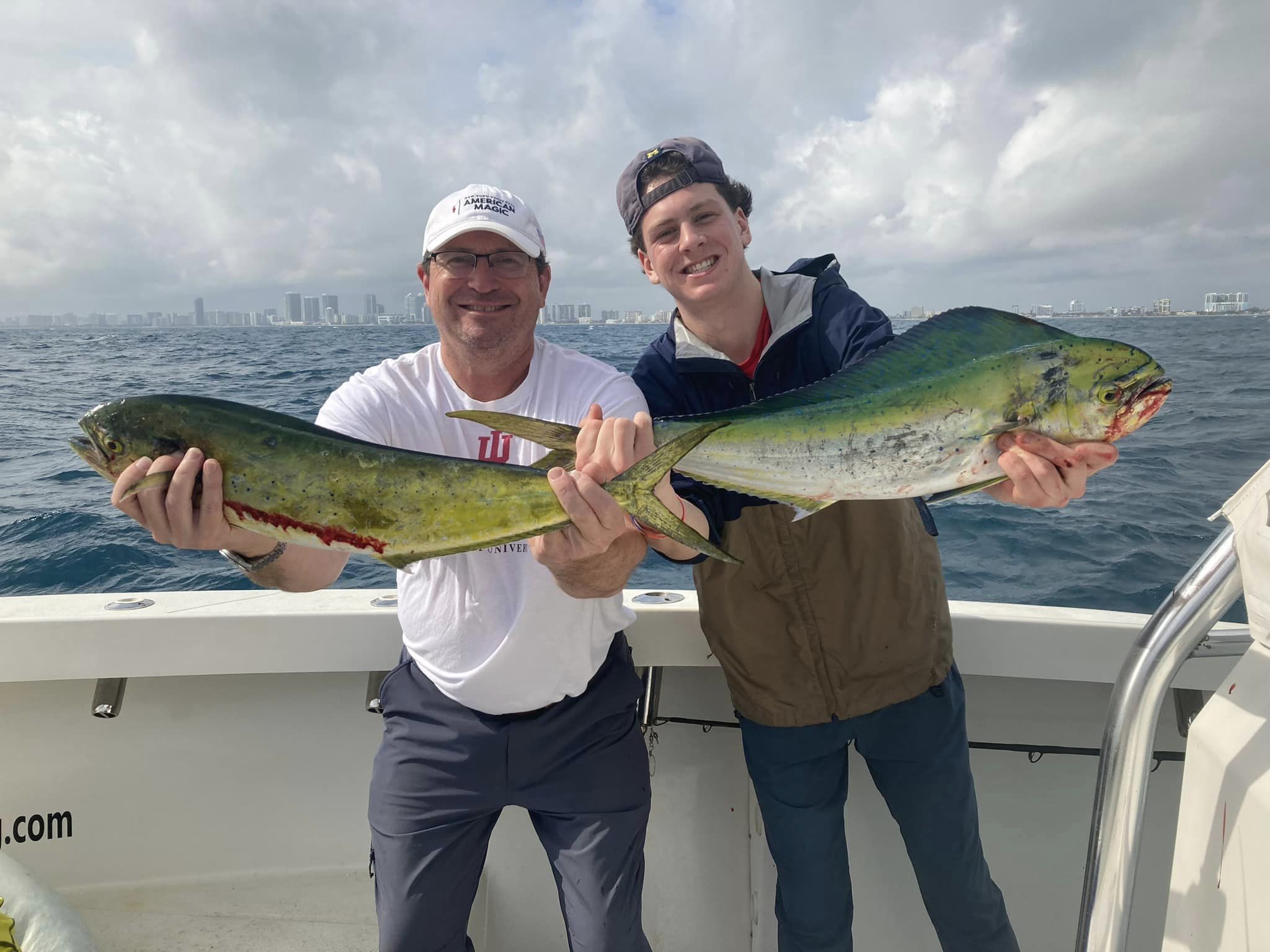 Two anglers reeling in big fish in FL