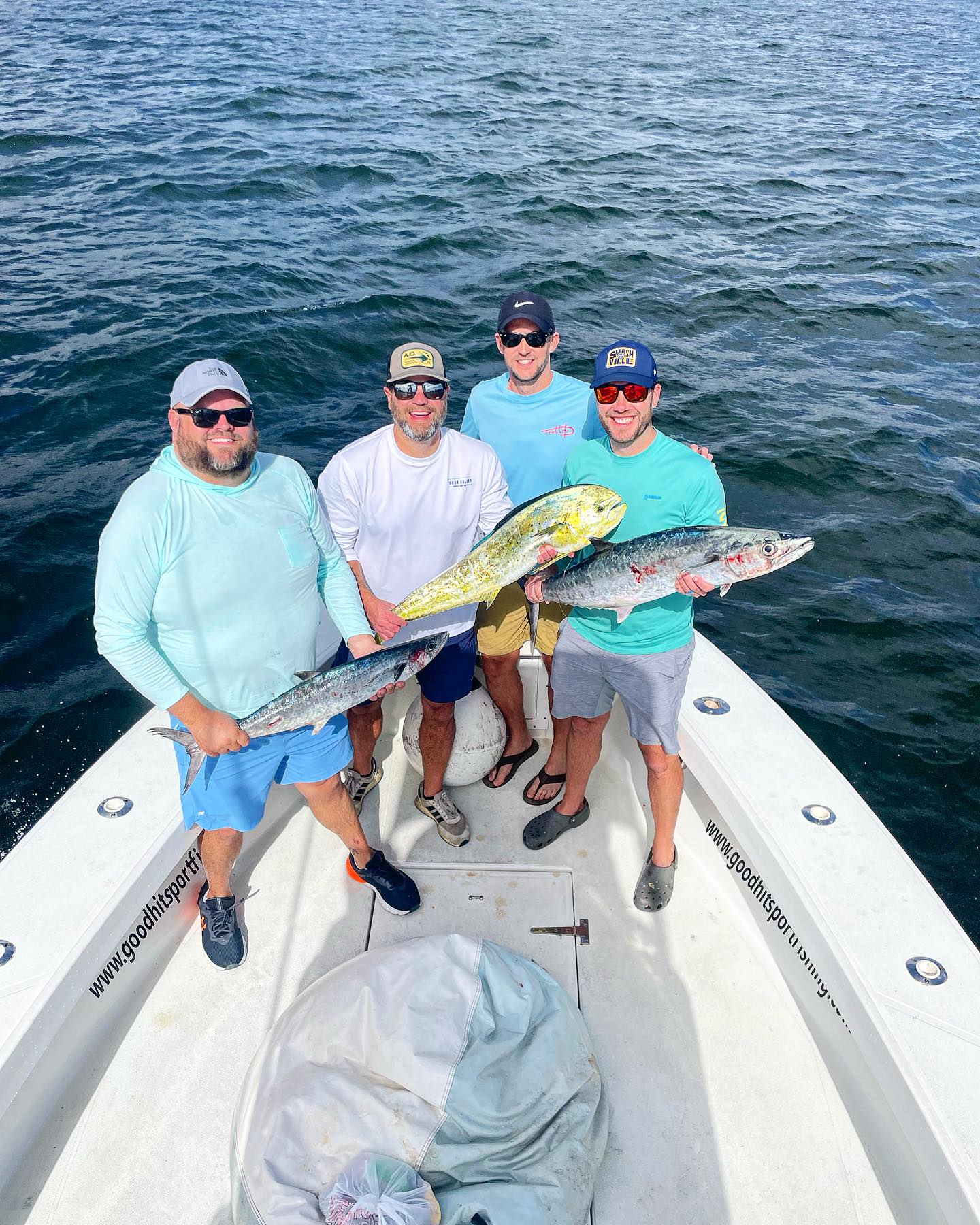 Four people fishing in Fort Lauderdale with two 15-inch fish