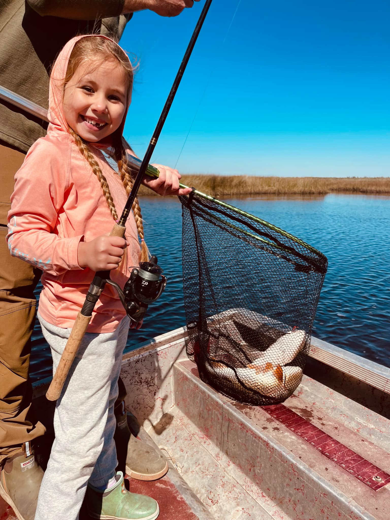 Two people enjoying a fishing, hunting, and tours adventure in FL