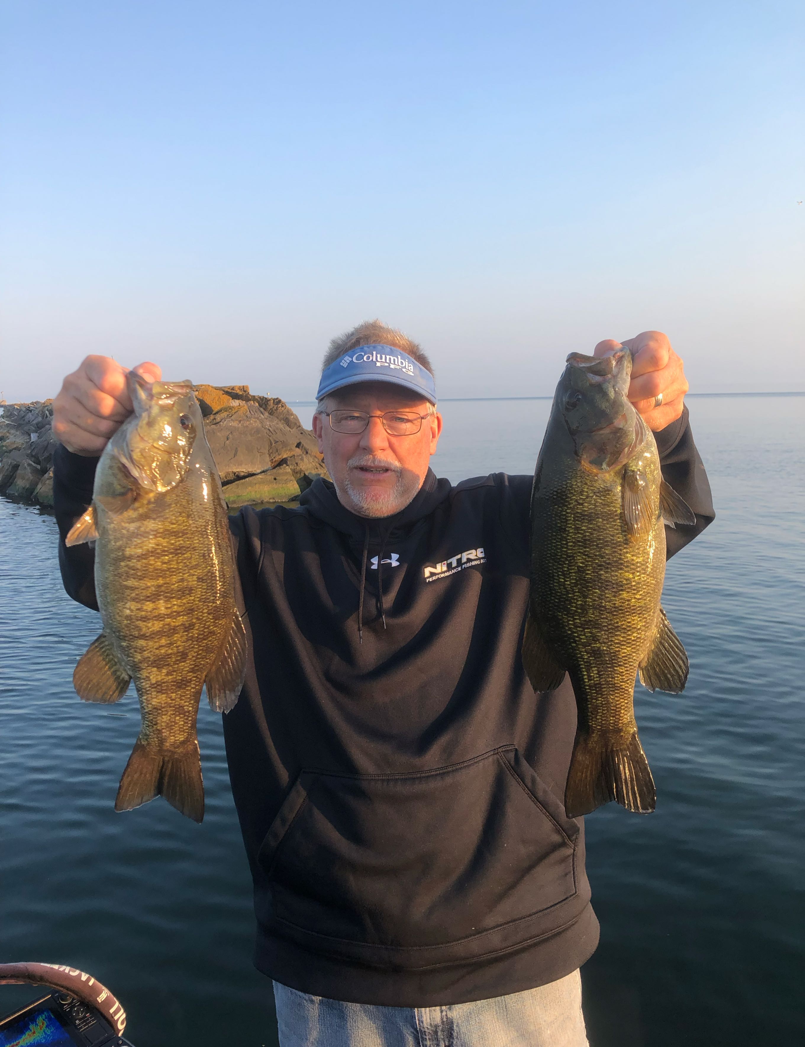 Two anglers fishing in NY