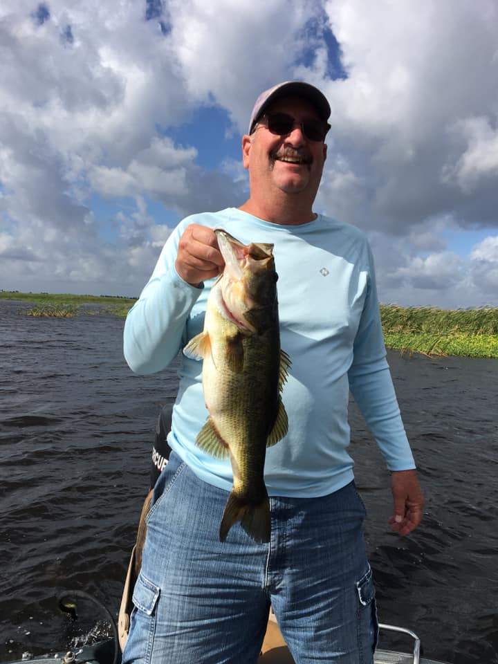 Angler holding a 17-inch fish in Florida