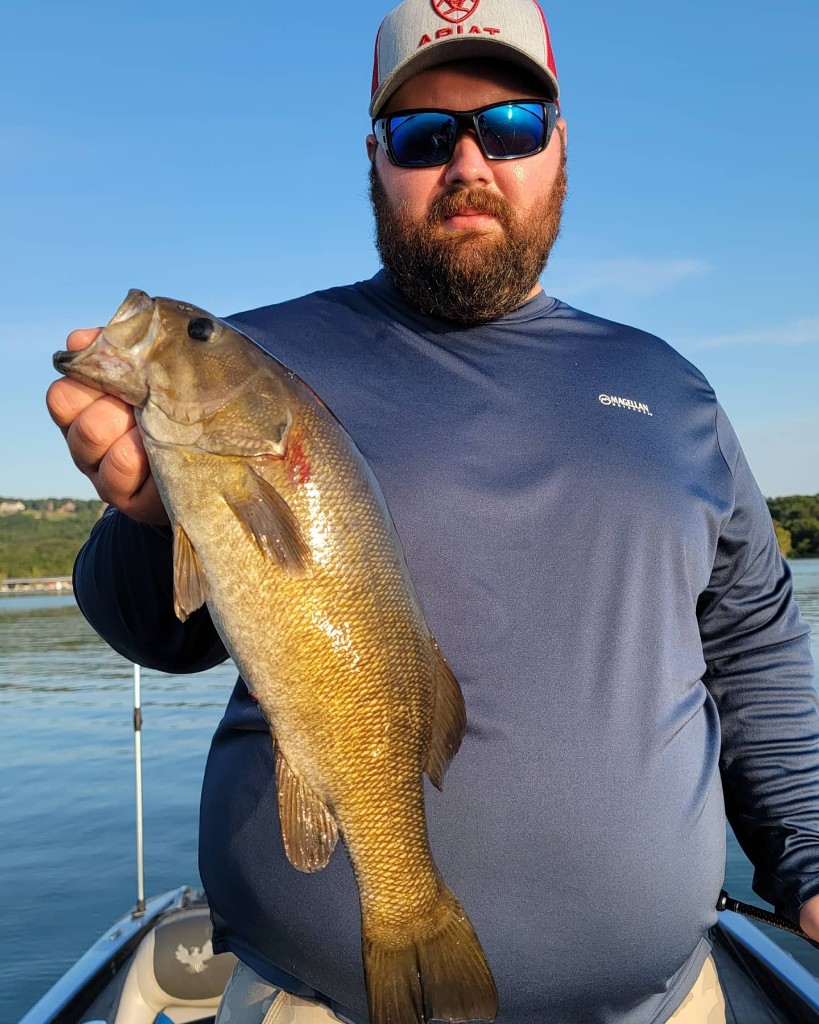 Angler holding a 17-inch fish in MO