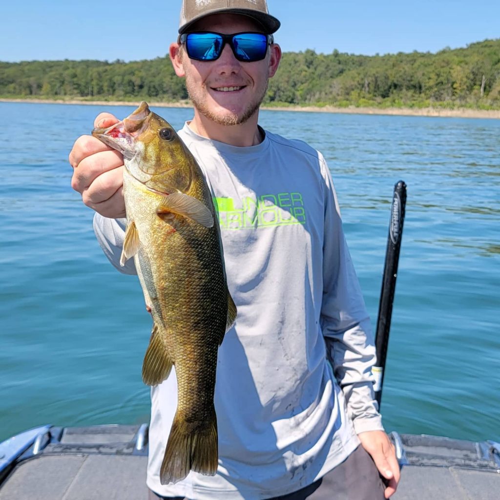 A lone angler reeling in a 19-inch catch in Missouri