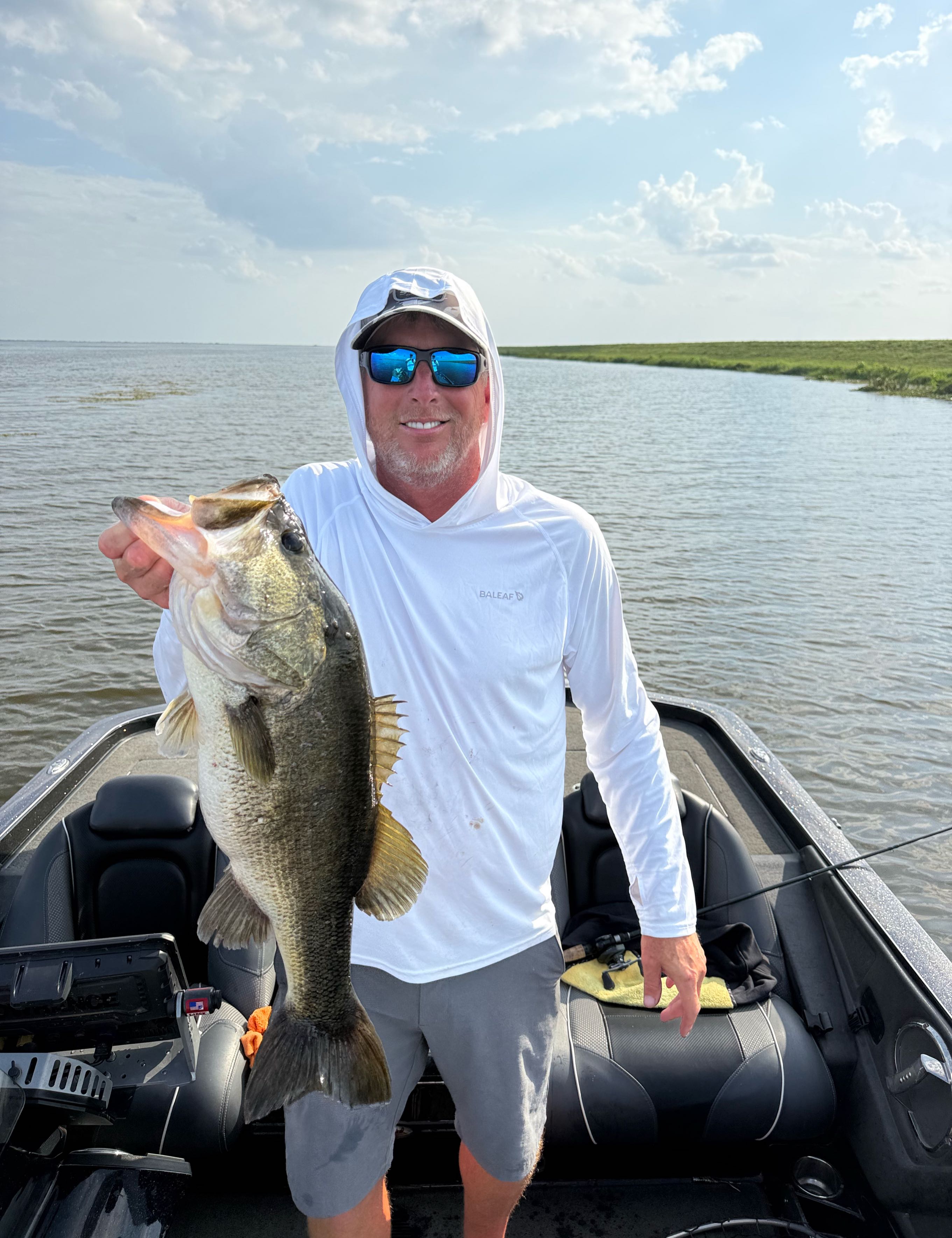 Bass fishing boat on Headwaters Lake Florida with Captain Kevin Wolfram guide service