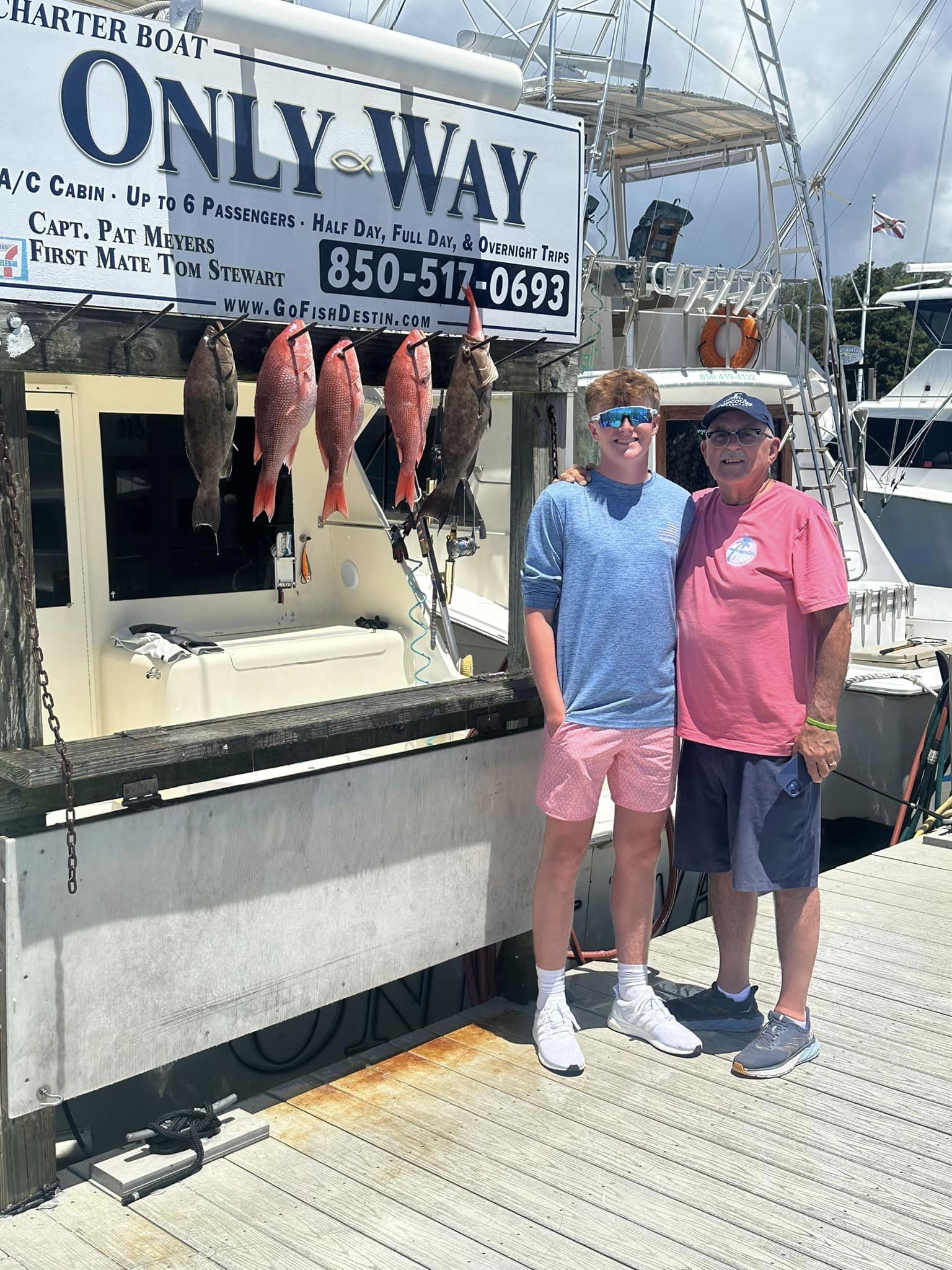 3 fishing rods with a scenic view of Destin