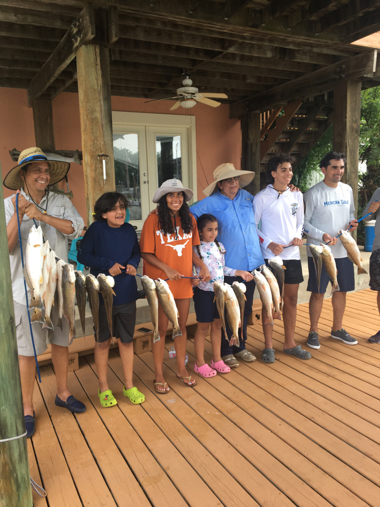 Seven anglers enjoying a fishing trip in TX