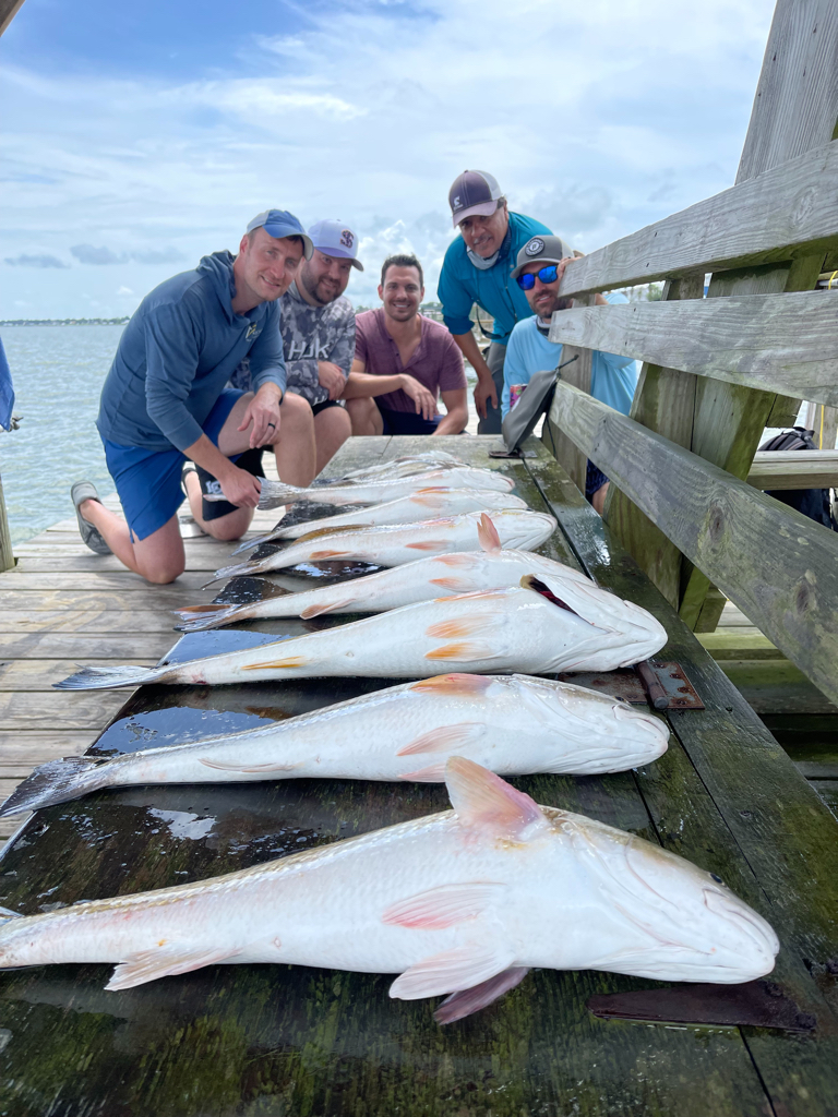 5 people with 2 large fish in Kemah