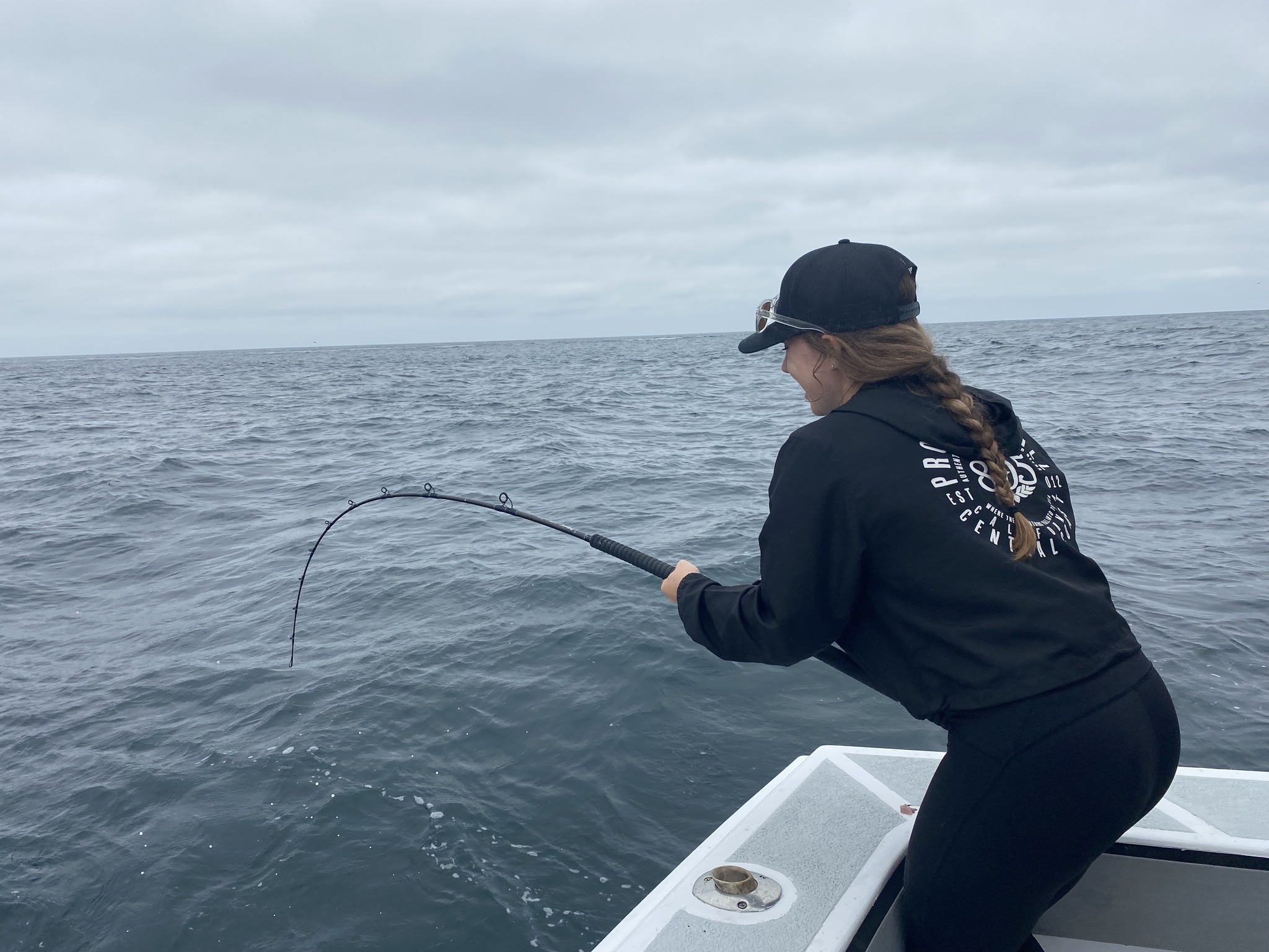 Lone fisherman casting line in California