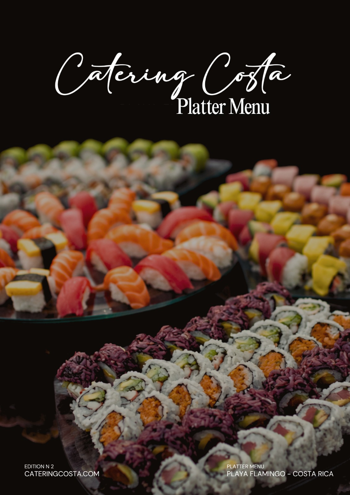 Colorful sushi platter with various rolls and nigiri pieces arranged on serving trays