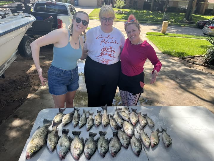 Fresh caught fish displayed on table after successful fishing trip in Lewisville TX