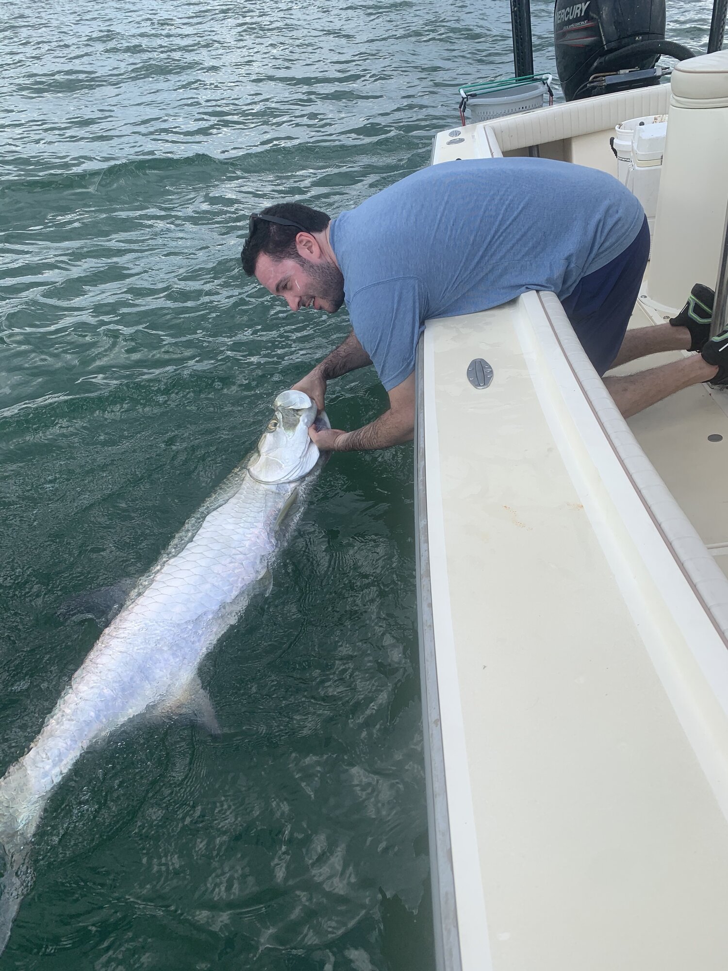 Angler reeling in a 30-inch fish in Florida