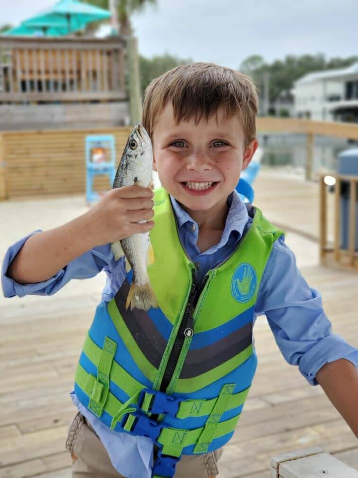 A person fishing in Orange Beach