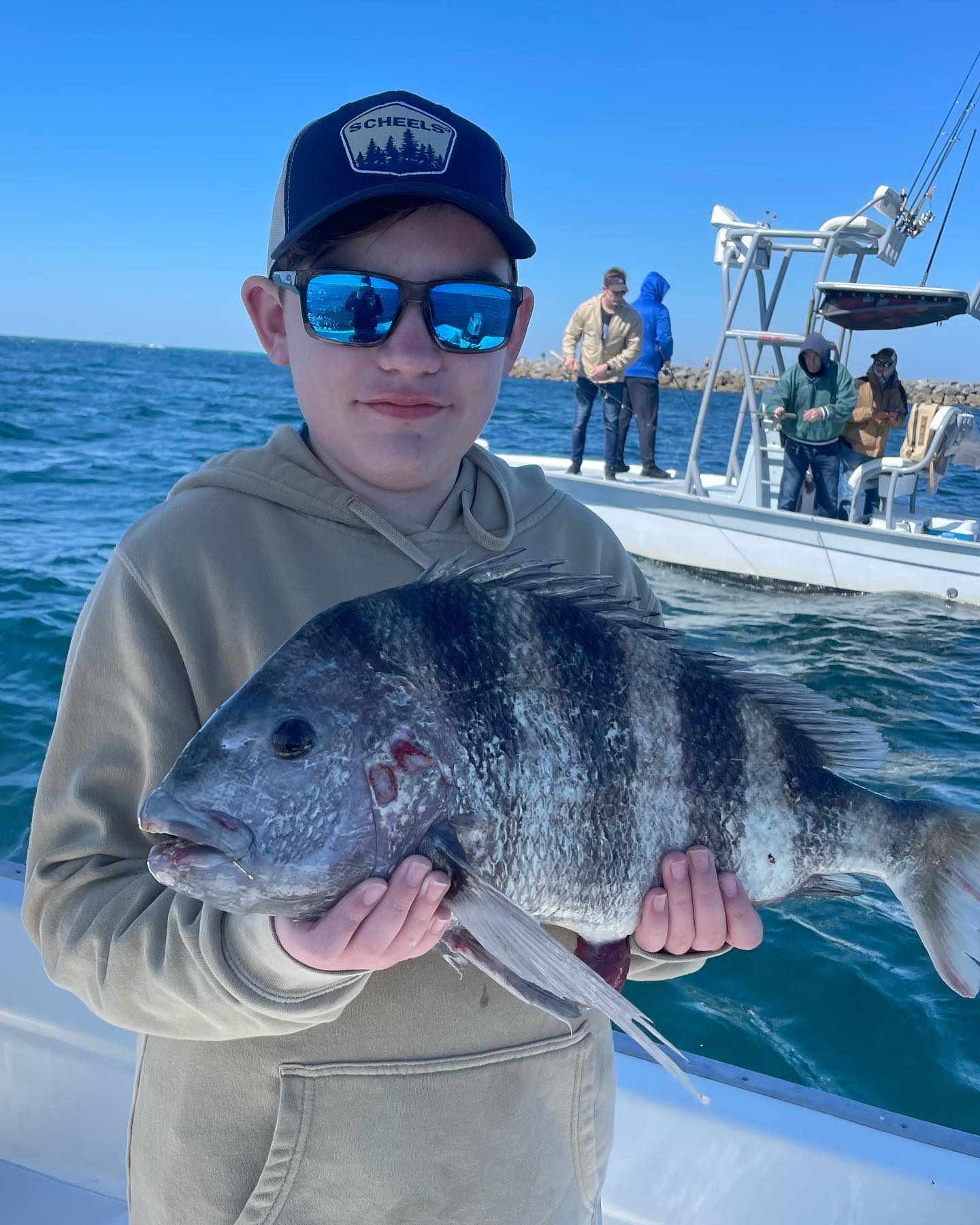 Fisherman with a black drum fish in Florida