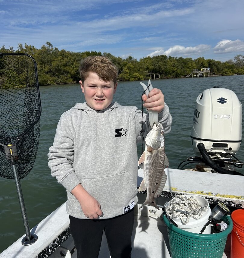 Redfish caught while fishing in Bay Pines FL displayed on boat
