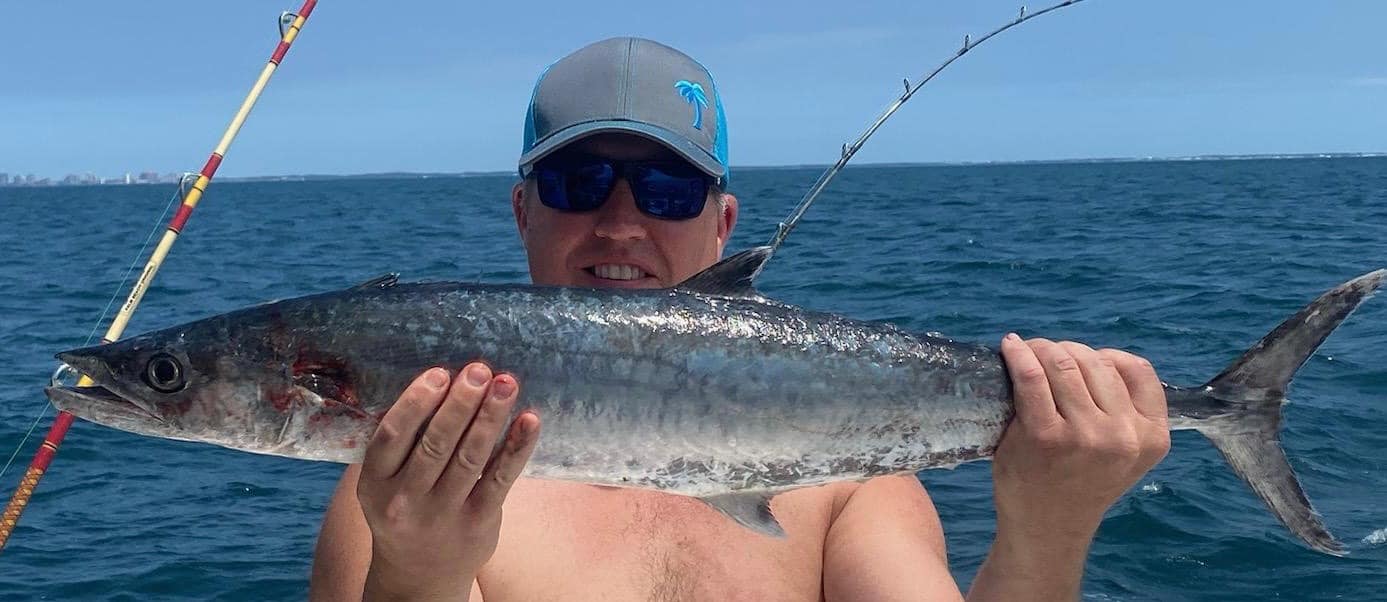 King mackerel caught during fishing tour on open ocean water