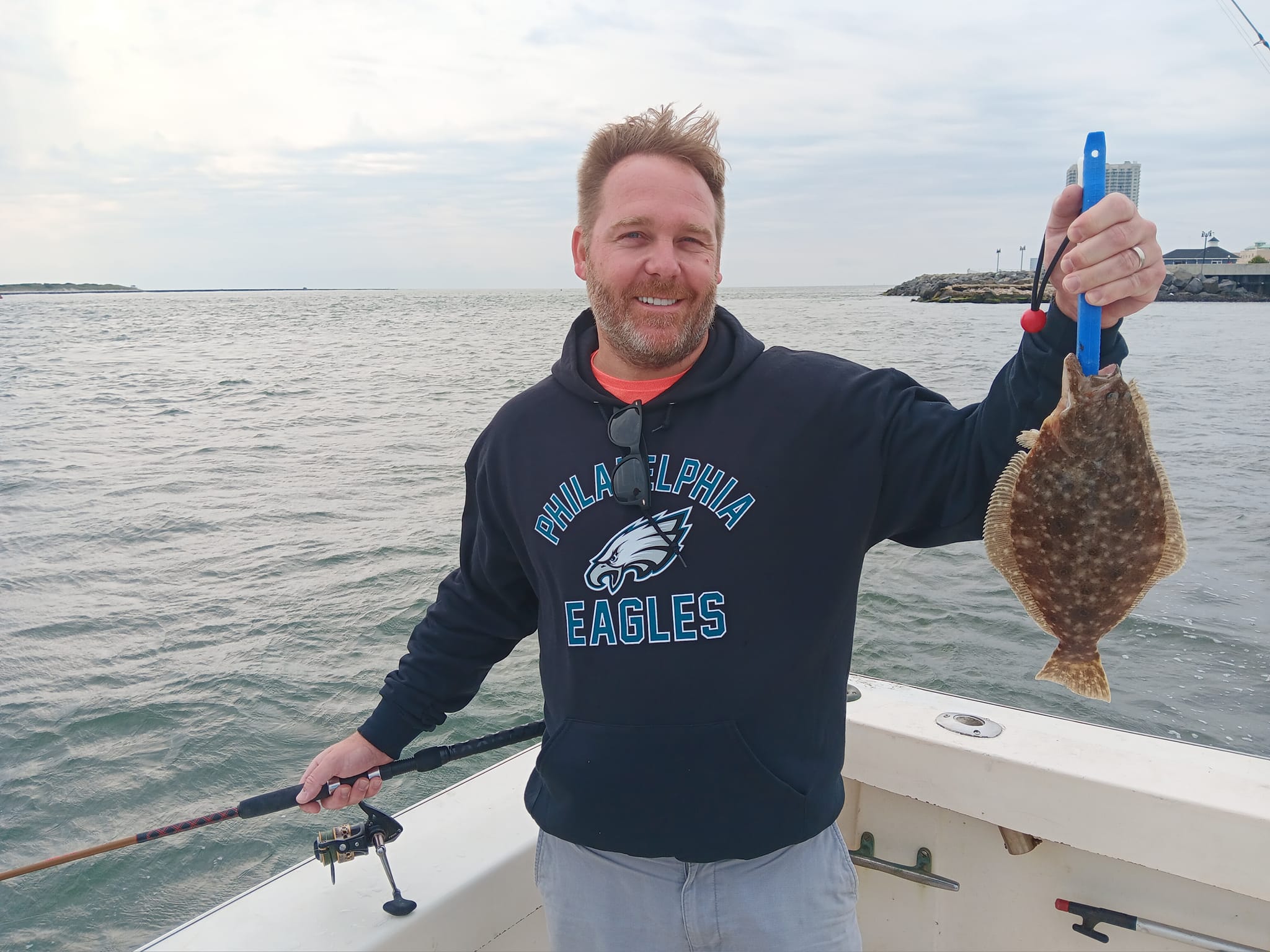 Photograph of a 12-inch summer flounder caught while fishing in NJ