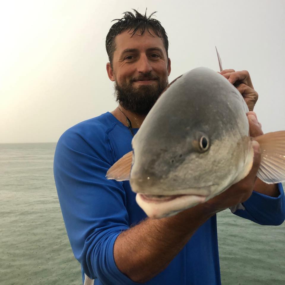 A fisherman with a 14-inch catch in FL