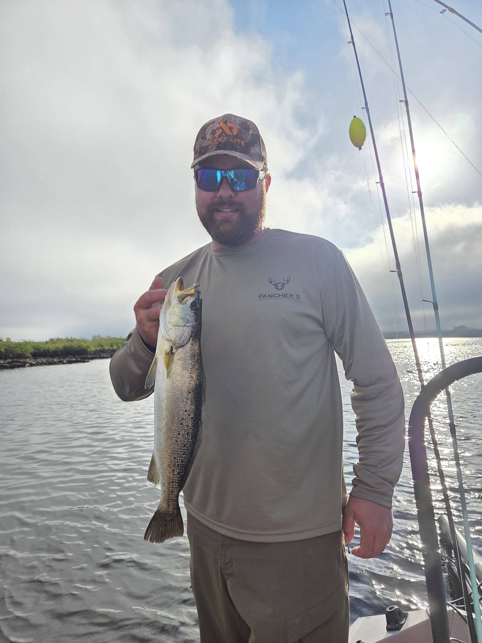 Speckled trout catch displayed on fishing boat in Bayport FL waters