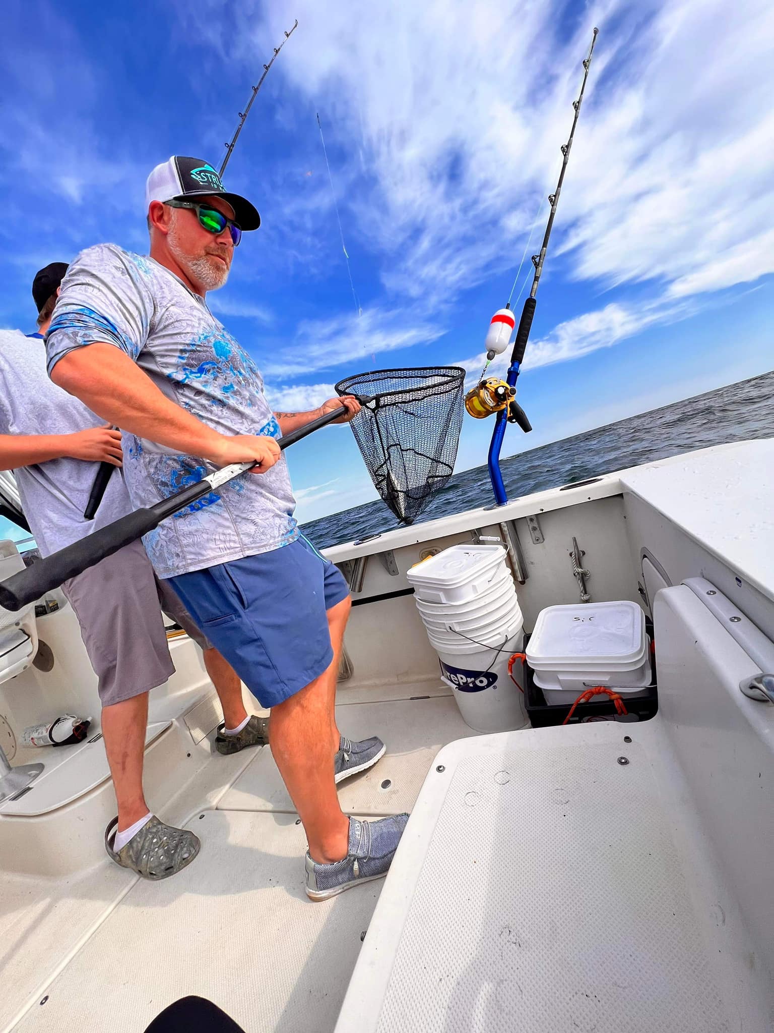 Angler enjoying a fishing trip in Saco