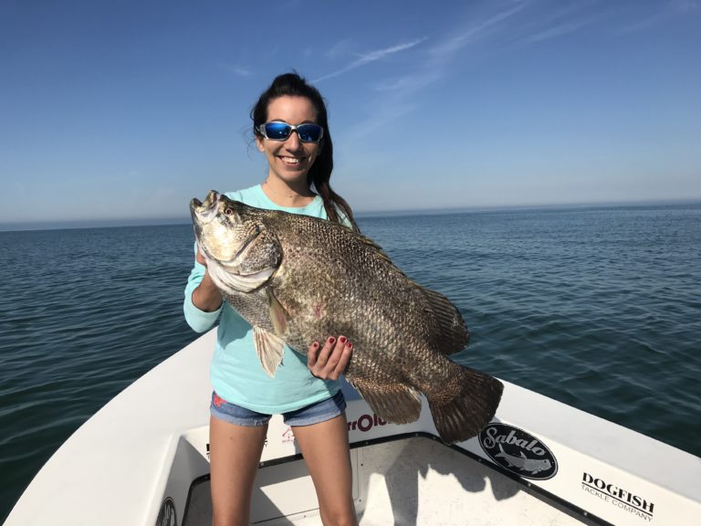 A person fishing for a Tripletail in St. Petersburg