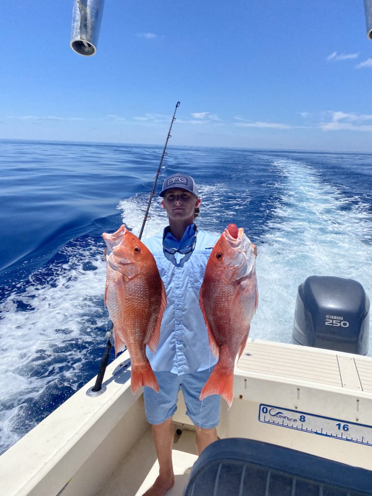 Deep sea fishing charter boat on Gulf of Mexico waters near St. Petersburg FL targeting snapper