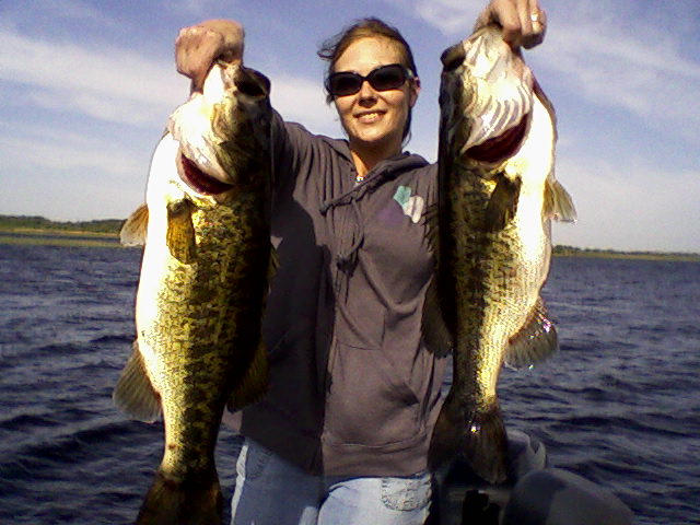 Two anglers reeling in a big catch at St. Cloud