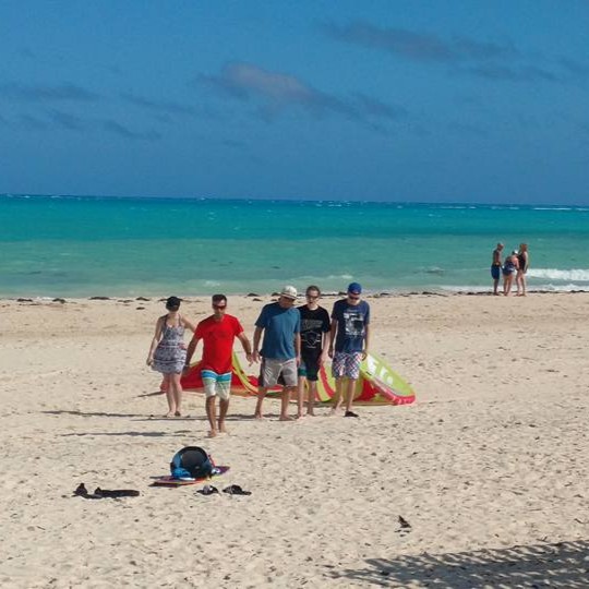 Miami sandbar boat rental with yacht anchored in crystal-clear Biscayne Bay waters